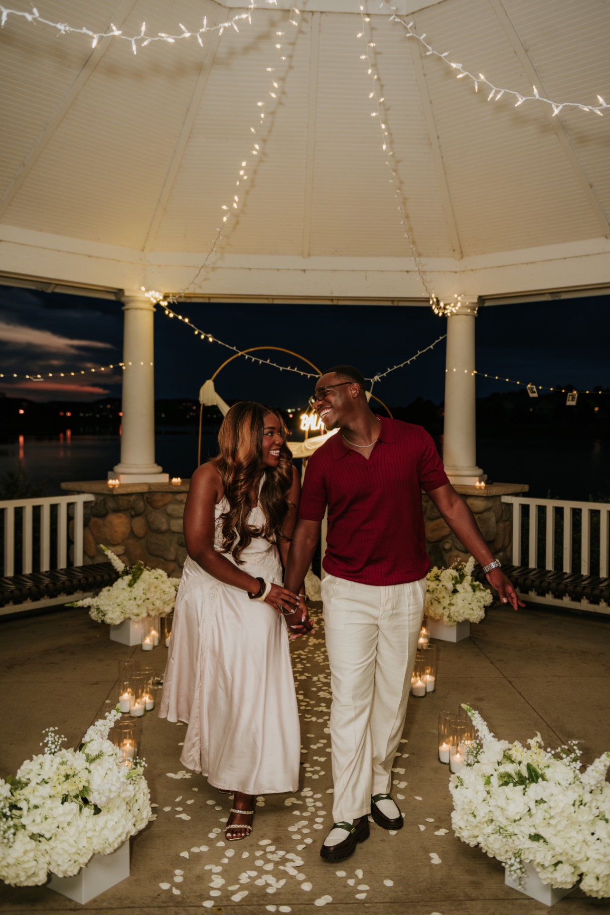 Riziane and Lael walking together after their proposal